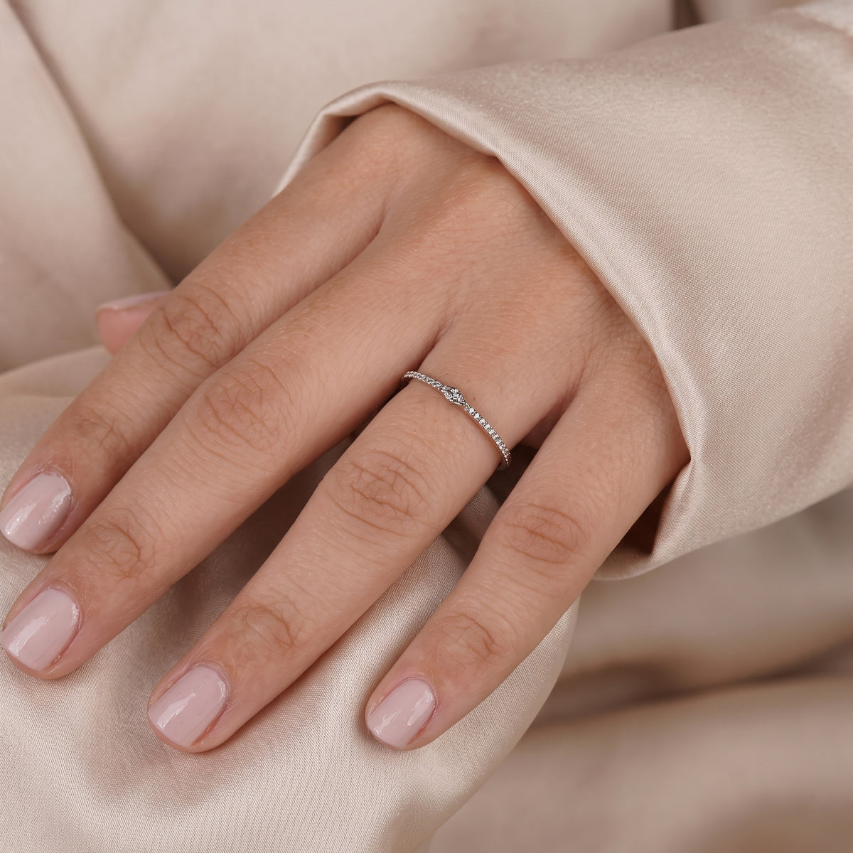 east-west marquise center pave diamond band