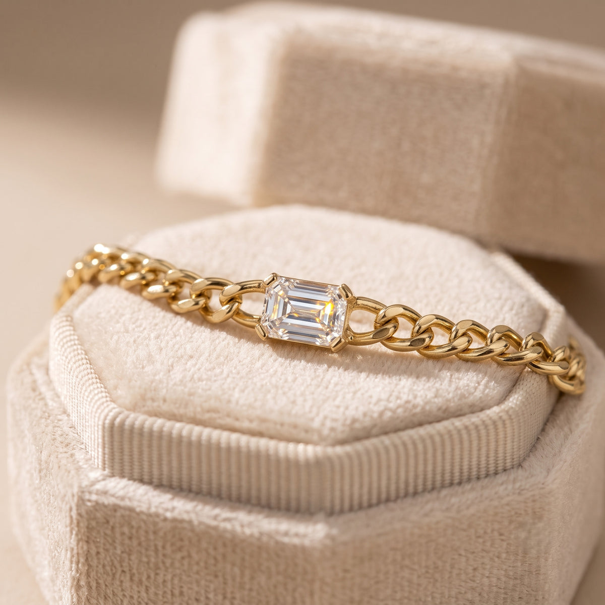 east-west emerald cut diamond curb chain bracelet