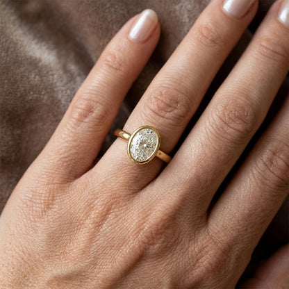 Oval Cut Lab Grown Diamond Bezel Engagement Ring