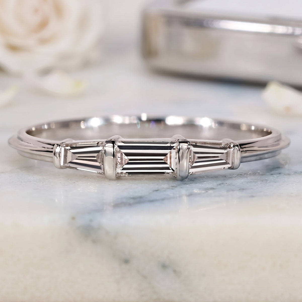 three-stone tapered baguette diamond band in gold