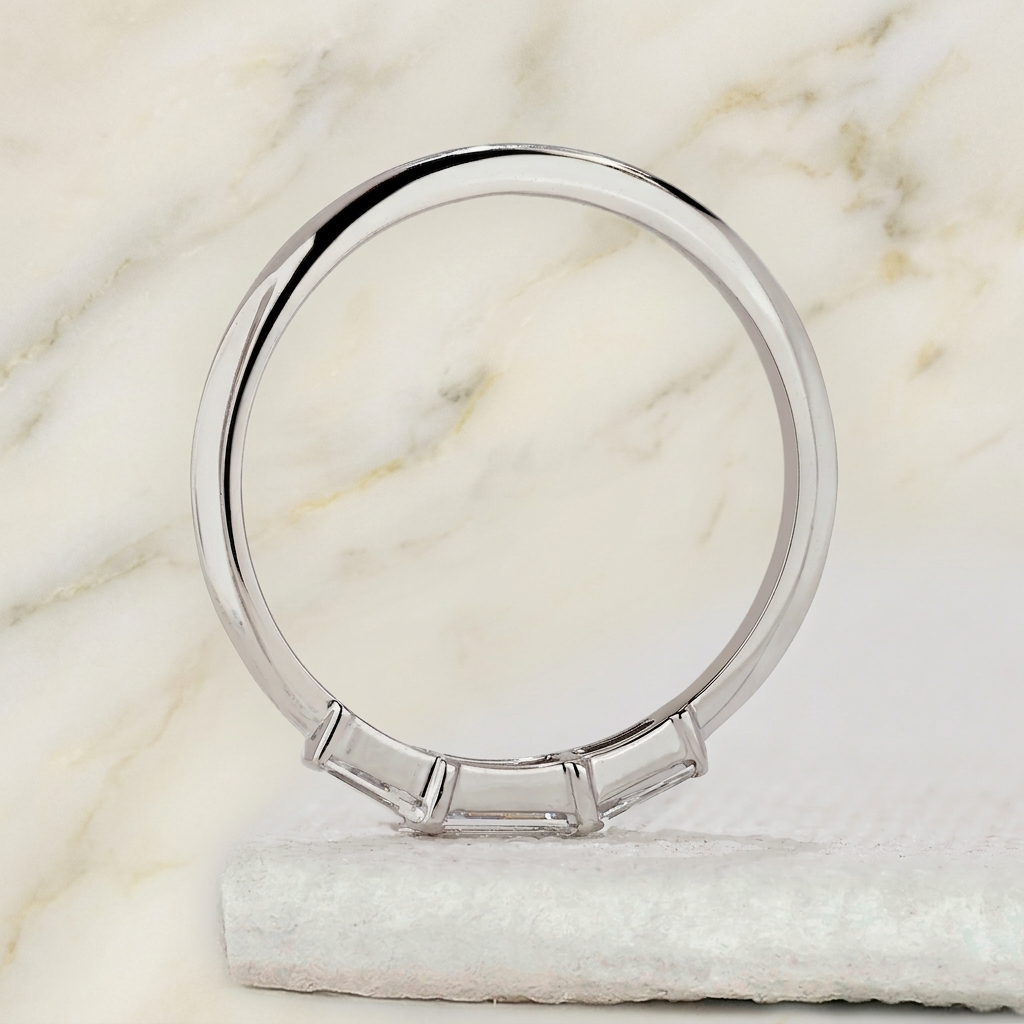 three-stone tapered baguette diamond band in gold