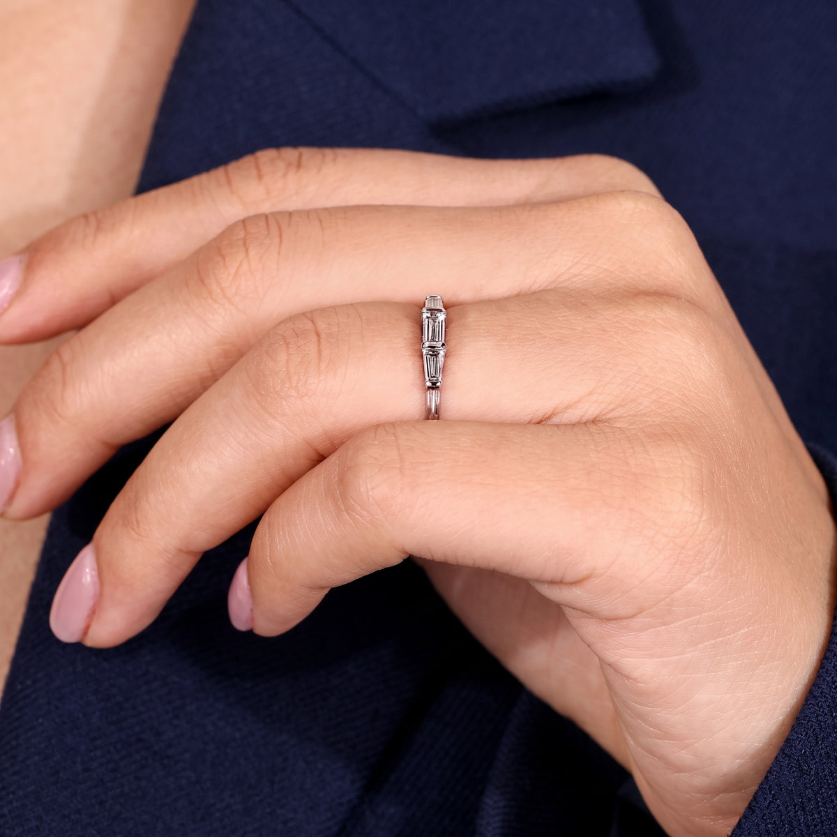 three-stone tapered baguette diamond band in gold
