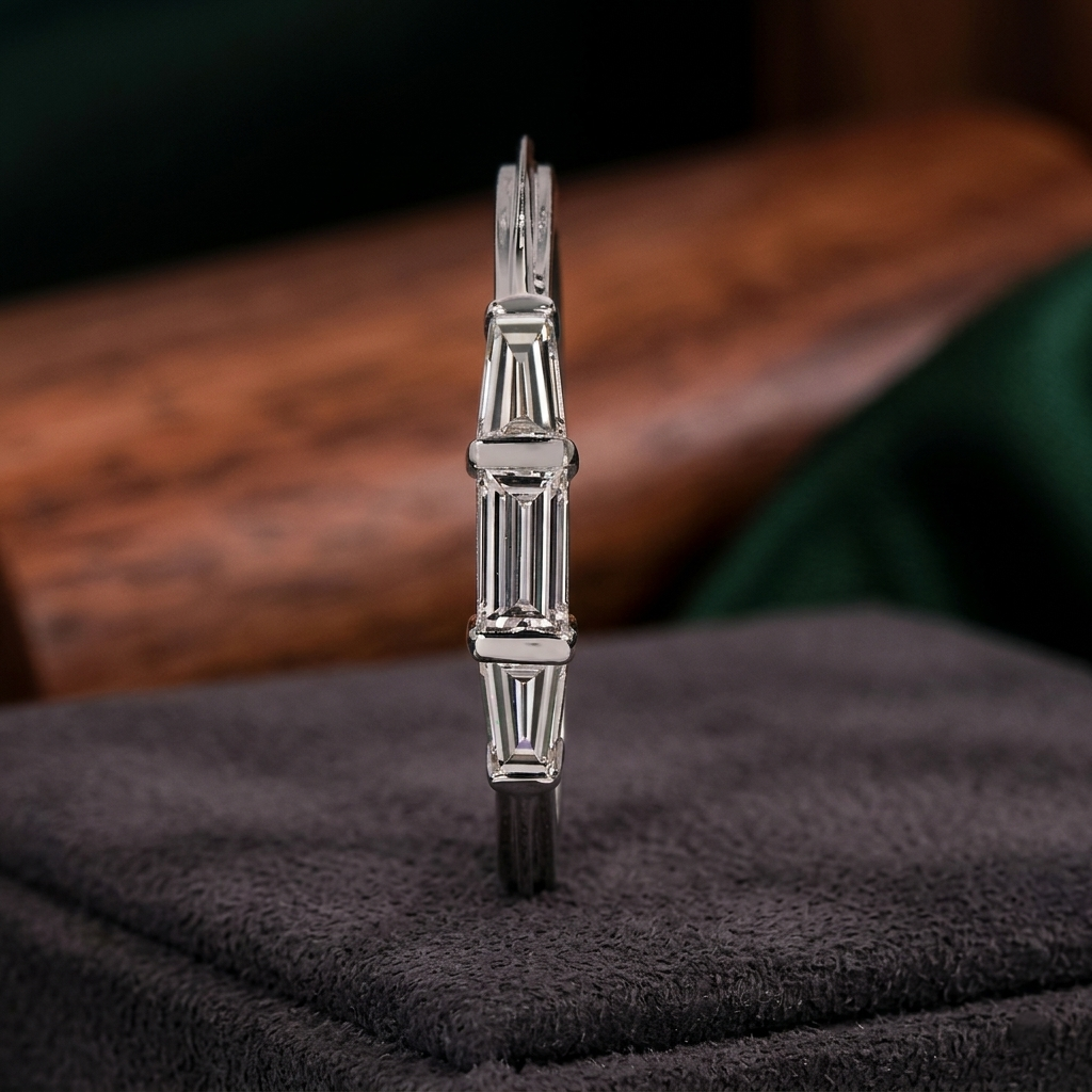 three-stone tapered baguette diamond band in gold