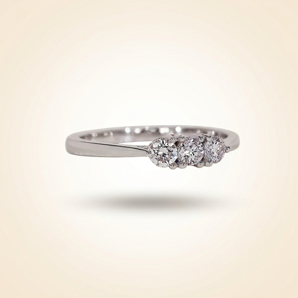 three-stone round diamond shared-prong band