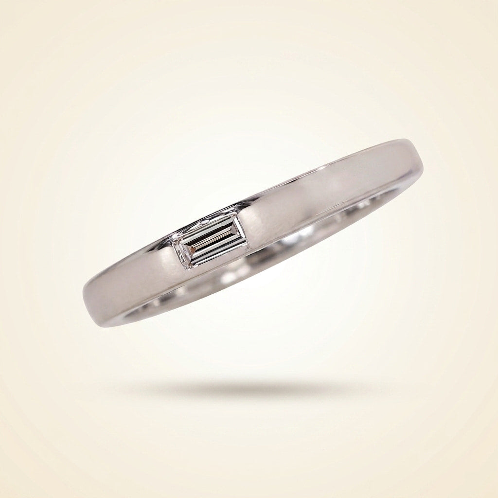 single flush-set baguette diamond solitaire band