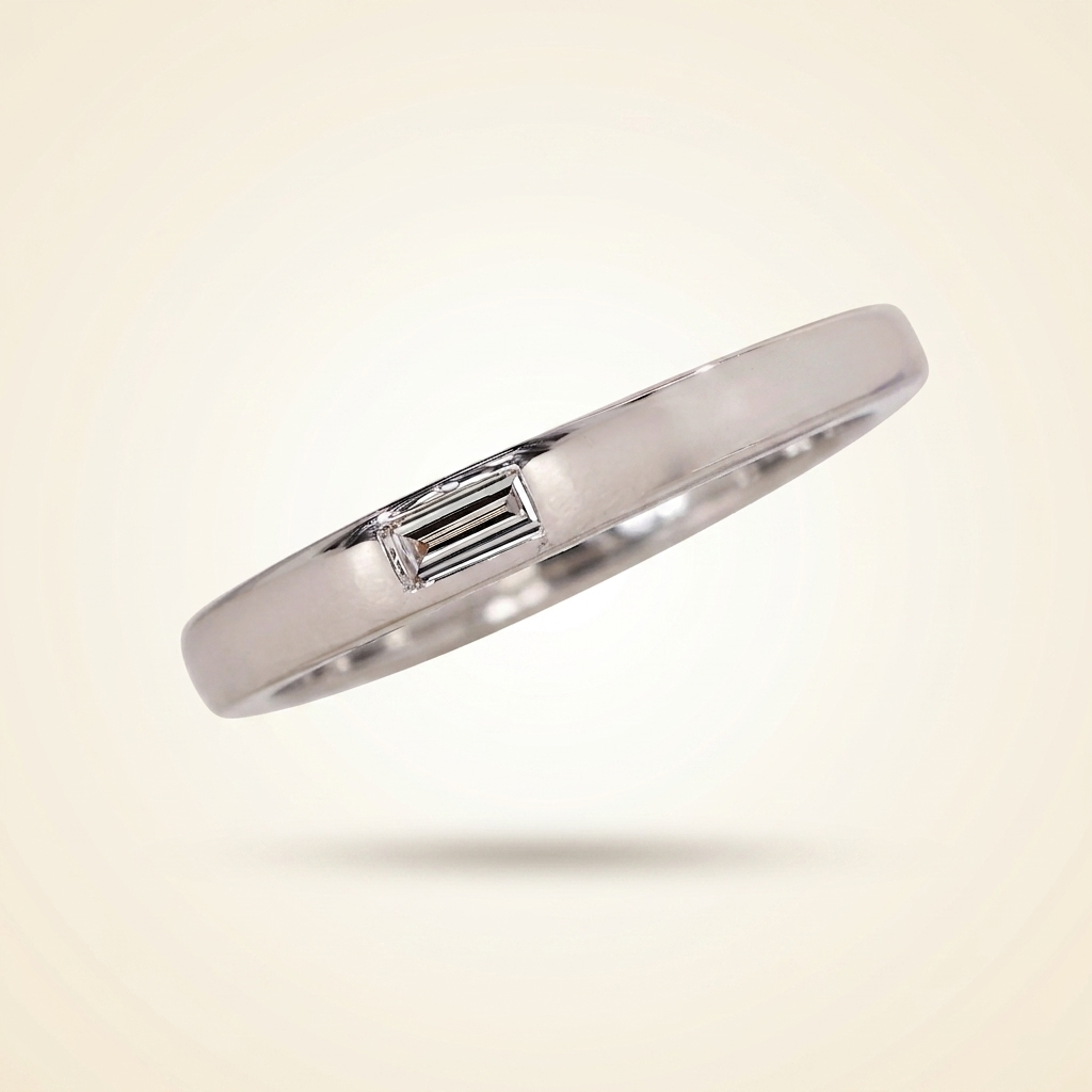 single flush-set baguette diamond solitaire band