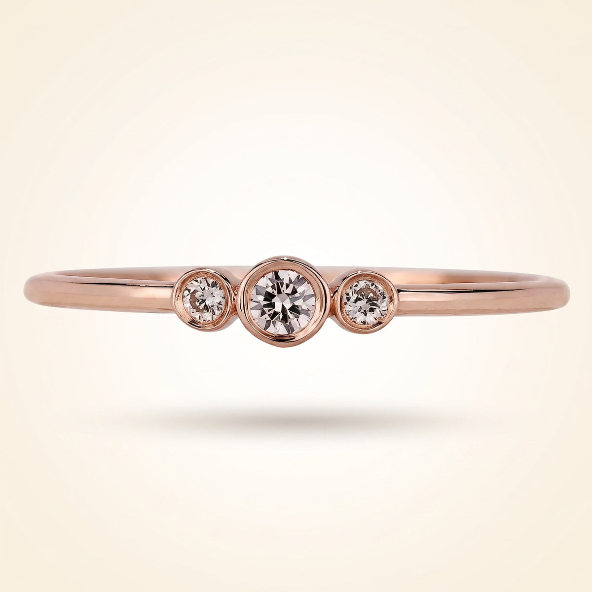 bezel-set three-stone diamond band