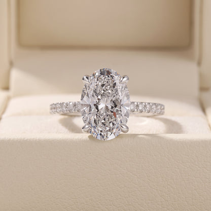 Oval Cut Diamond Engagement Ring with Pave Band and Hidden Halo