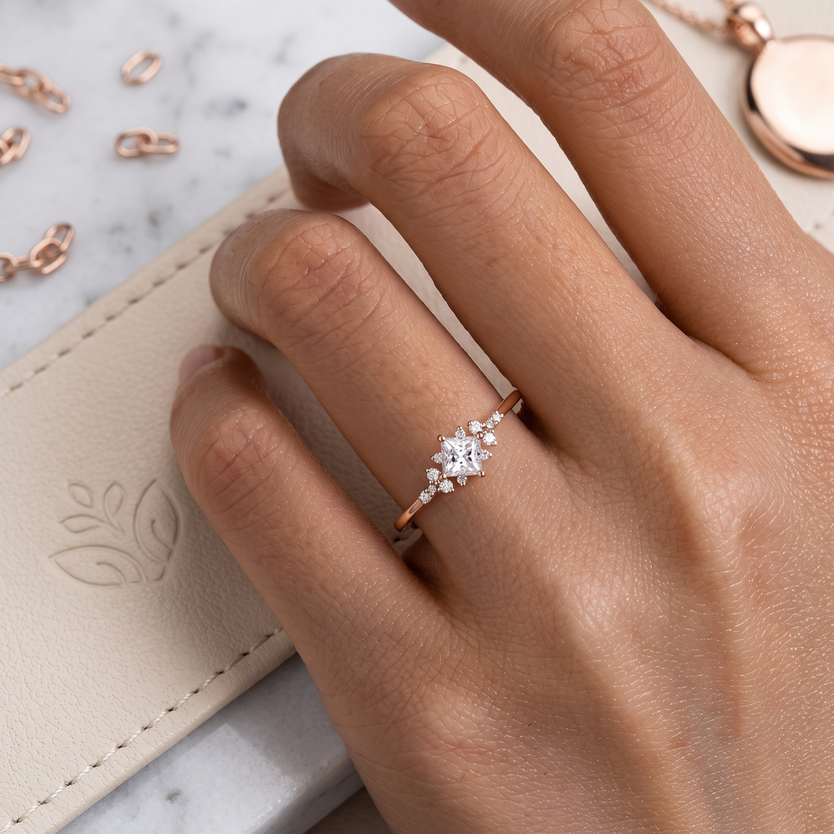 kite cut princess engagement ring with snowflake cluster side accents