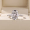 Oval Cut Diamond Engagement Ring with Pave Band and Hidden Halo