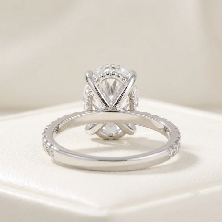 Oval Cut Diamond Engagement Ring with Pave Band and Hidden Halo