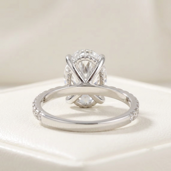 Oval Cut Diamond Engagement Ring with Pave Band and Hidden Halo