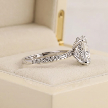 Oval Cut Diamond Engagement Ring with Pave Band and Hidden Halo