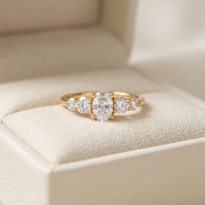 Oval Cut Diamond Five Stone Engagement Ring with Graduated Round Side Accents