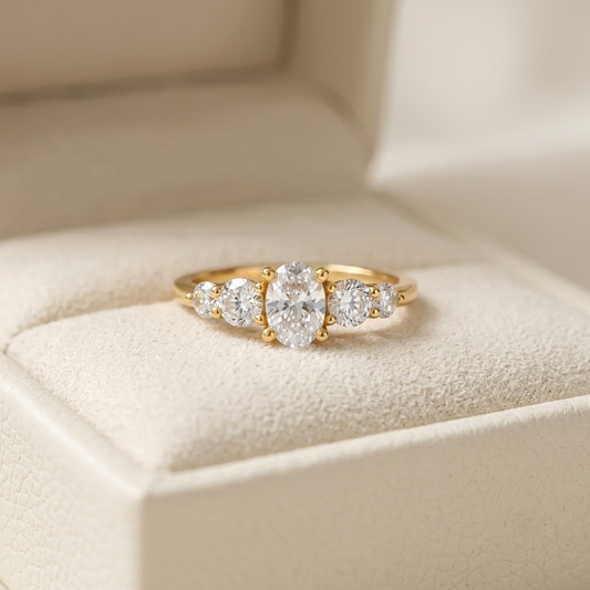 Oval Cut Diamond Five Stone Engagement Ring with Graduated Round Side Accents