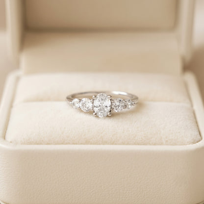 Oval Cut Diamond Five Stone Engagement Ring with Graduated Round Side Accents