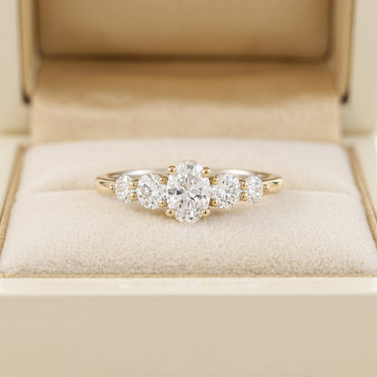 Oval Cut Diamond Five Stone Engagement Ring with Graduated Round Side Accents