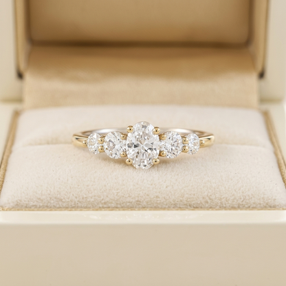 Oval Cut Diamond Five Stone Engagement Ring with Graduated Round Side Accents