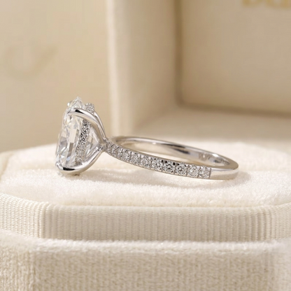 Oval Cut Diamond Engagement Ring with Pave Band and Hidden Halo