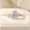 Oval Cut Diamond Engagement Ring with Asymmetric Scatter Side Accents