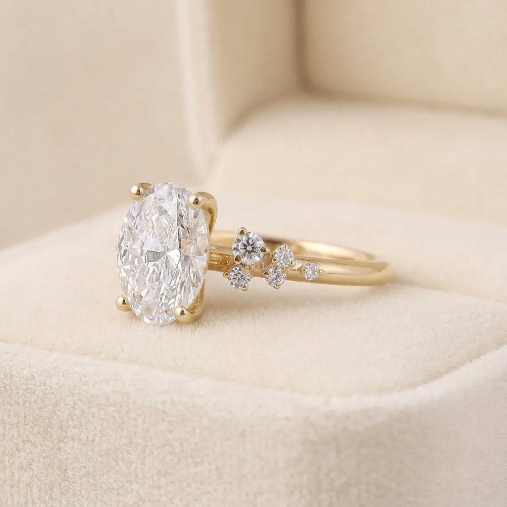 oval cut diamond engagement ring with asymmetric scatter side accents