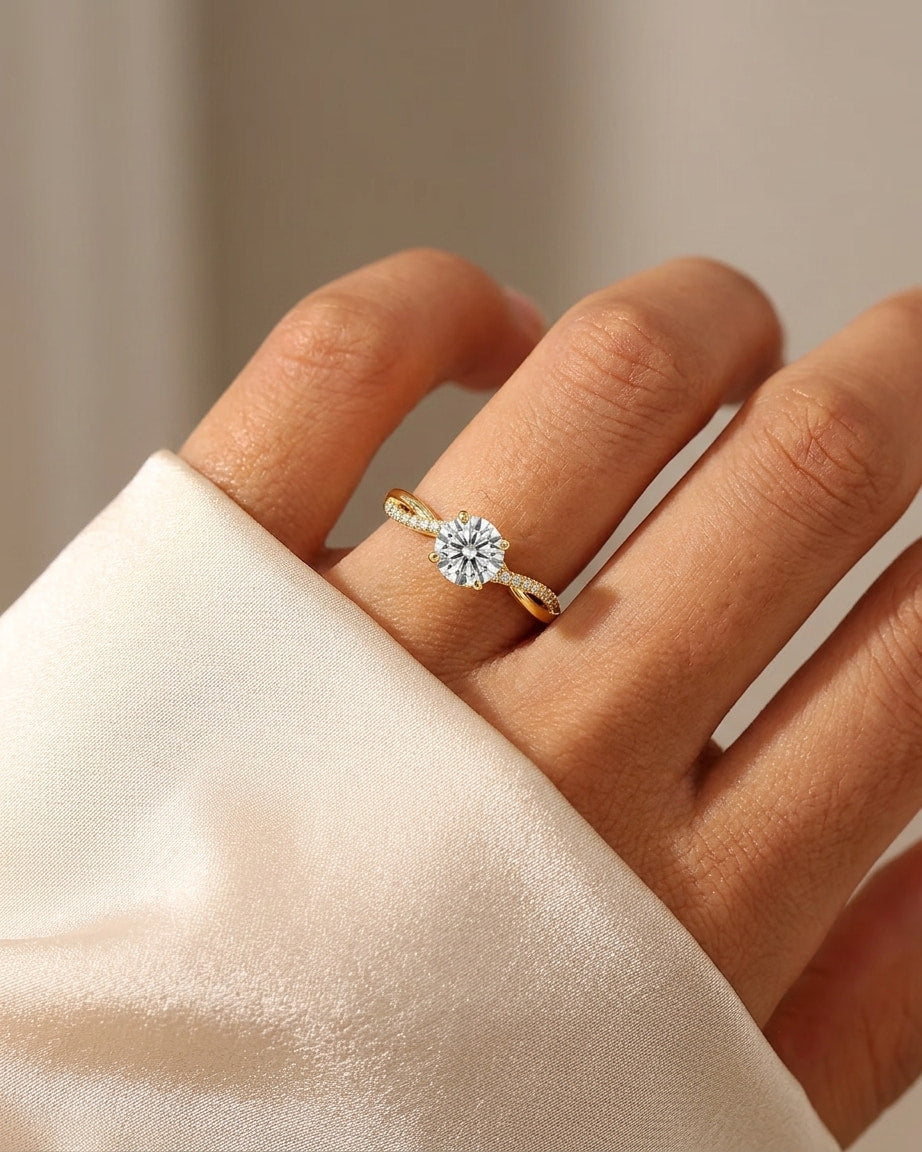 round cut diamond engagement ring with twisted pave band