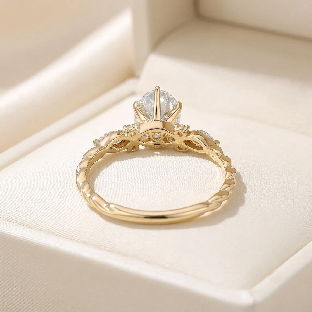 oval cut diamond engagement ring with twisted band and marquise accents