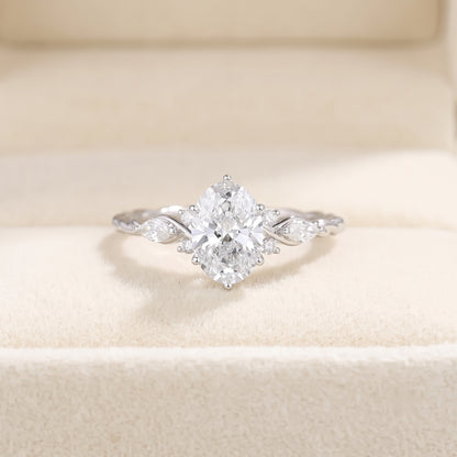 Oval Cut Diamond Engagement Ring with Twisted Band and Marquise Accents