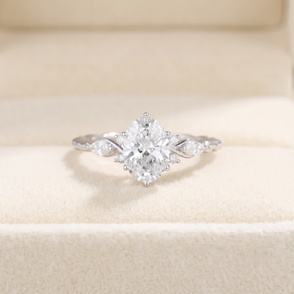 Oval Cut Diamond Engagement Ring with Twisted Band and Marquise Accents