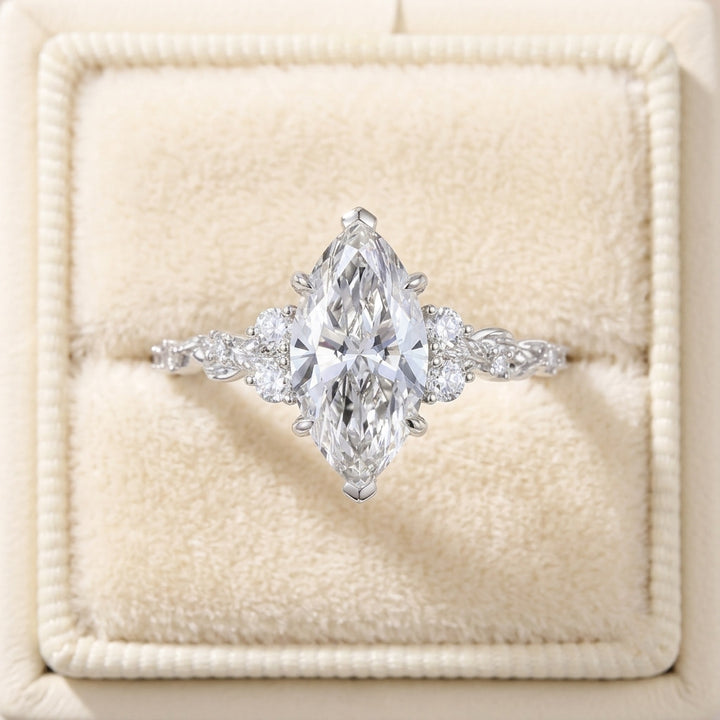 Marquise Cut Diamond Engagement Ring with Leaf Vine Band and Side Accents
