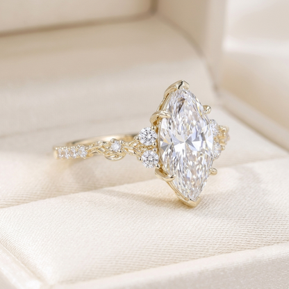 Marquise Cut Diamond Engagement Ring with Leaf Vine Band and Side Accents