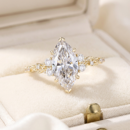 Marquise Cut Diamond Engagement Ring with Leaf Vine Band and Side Accents