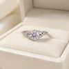 Round Brilliant Diamond Cluster Engagement Ring with Asymmetric Side Accents