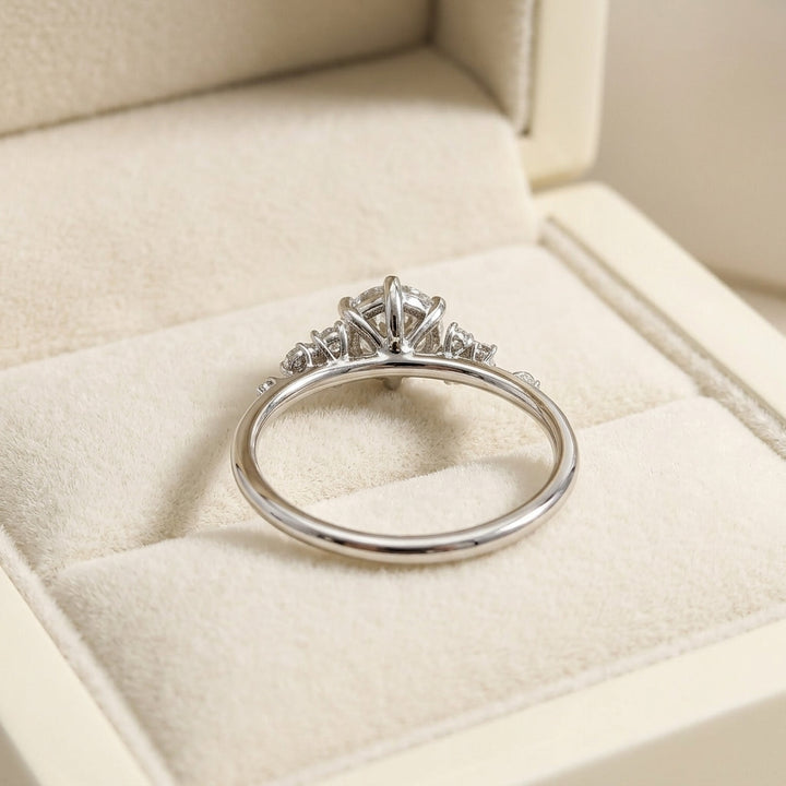 Round Brilliant Diamond Cluster Engagement Ring with Asymmetric Side Accents