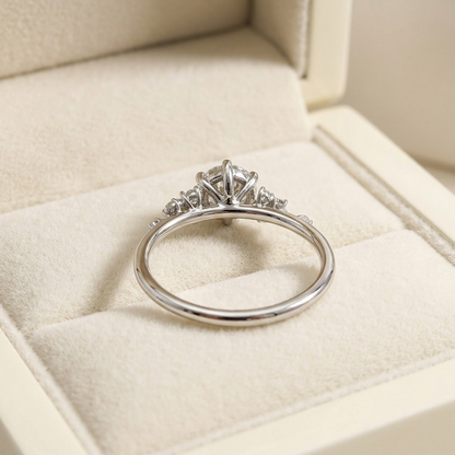 Round Brilliant Diamond Cluster Engagement Ring with Asymmetric Side Accents