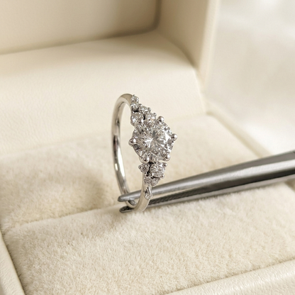 Round Brilliant Diamond Cluster Engagement Ring with Asymmetric Side Accents