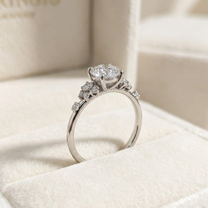 Round Brilliant Diamond Cluster Engagement Ring with Asymmetric Side Accents