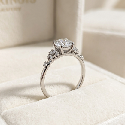 Round Brilliant Diamond Cluster Engagement Ring with Asymmetric Side Accents