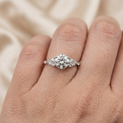 Round Brilliant Diamond Cluster Engagement Ring with Asymmetric Side Accents