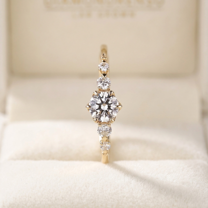 Round Cut Diamond Engagement Ring with Graduated Side Stones and Petal Gallery