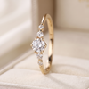 Round Cut Diamond Engagement Ring with Graduated Side Stones and Petal Gallery