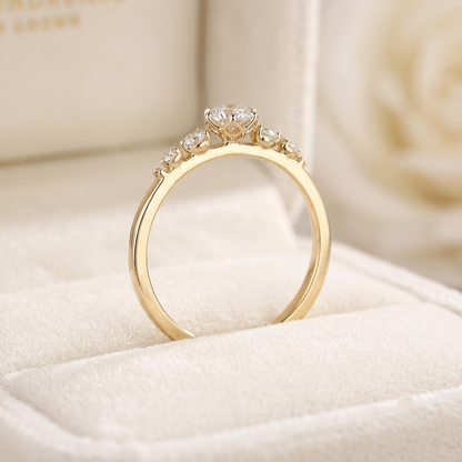 Round Cut Diamond Engagement Ring with Graduated Side Stones and Petal Gallery