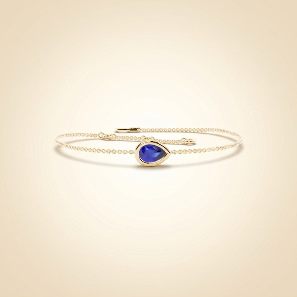 solitaire blue sapphire delicate chain bracelet