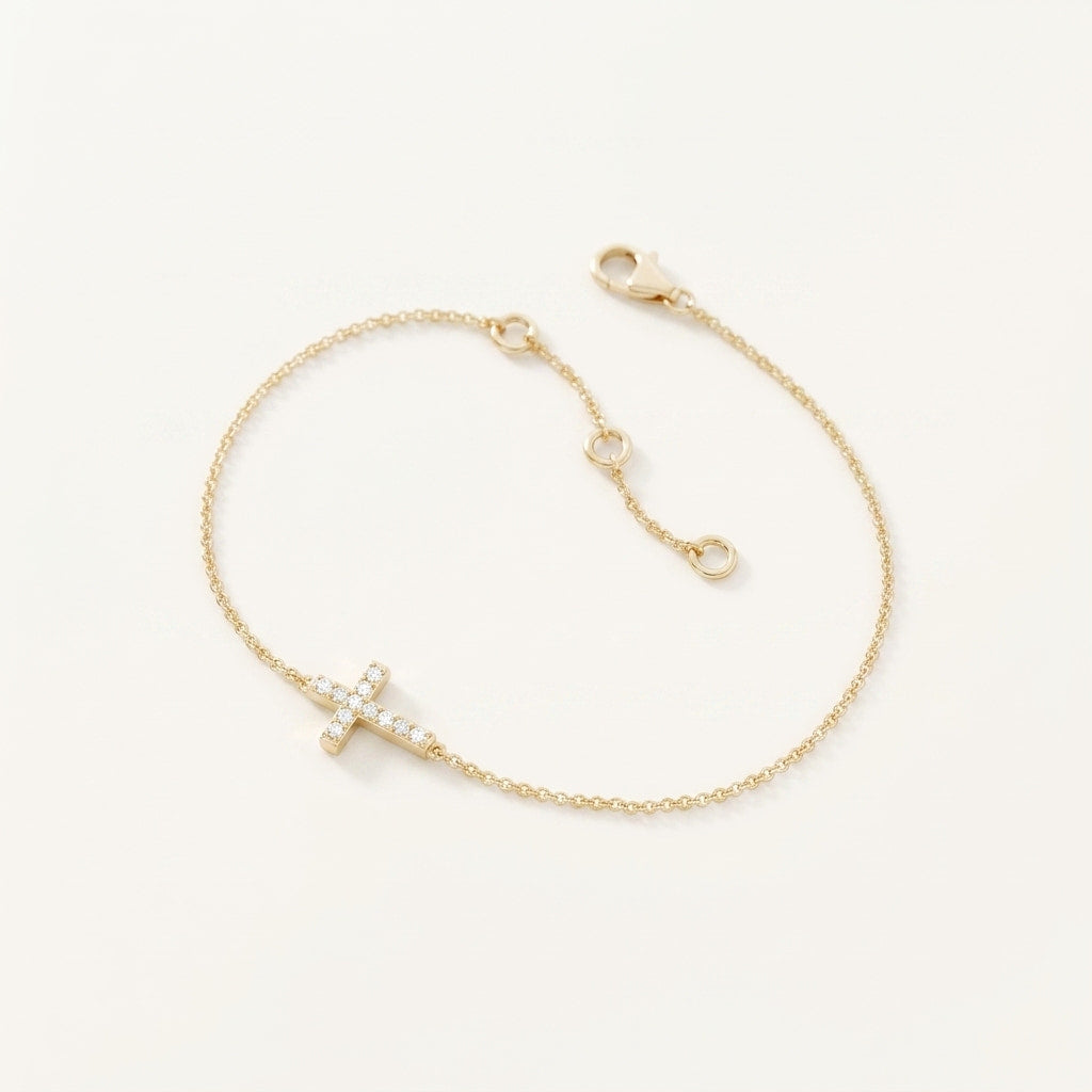 pavé diamond sideways cross chain bracelet in gold