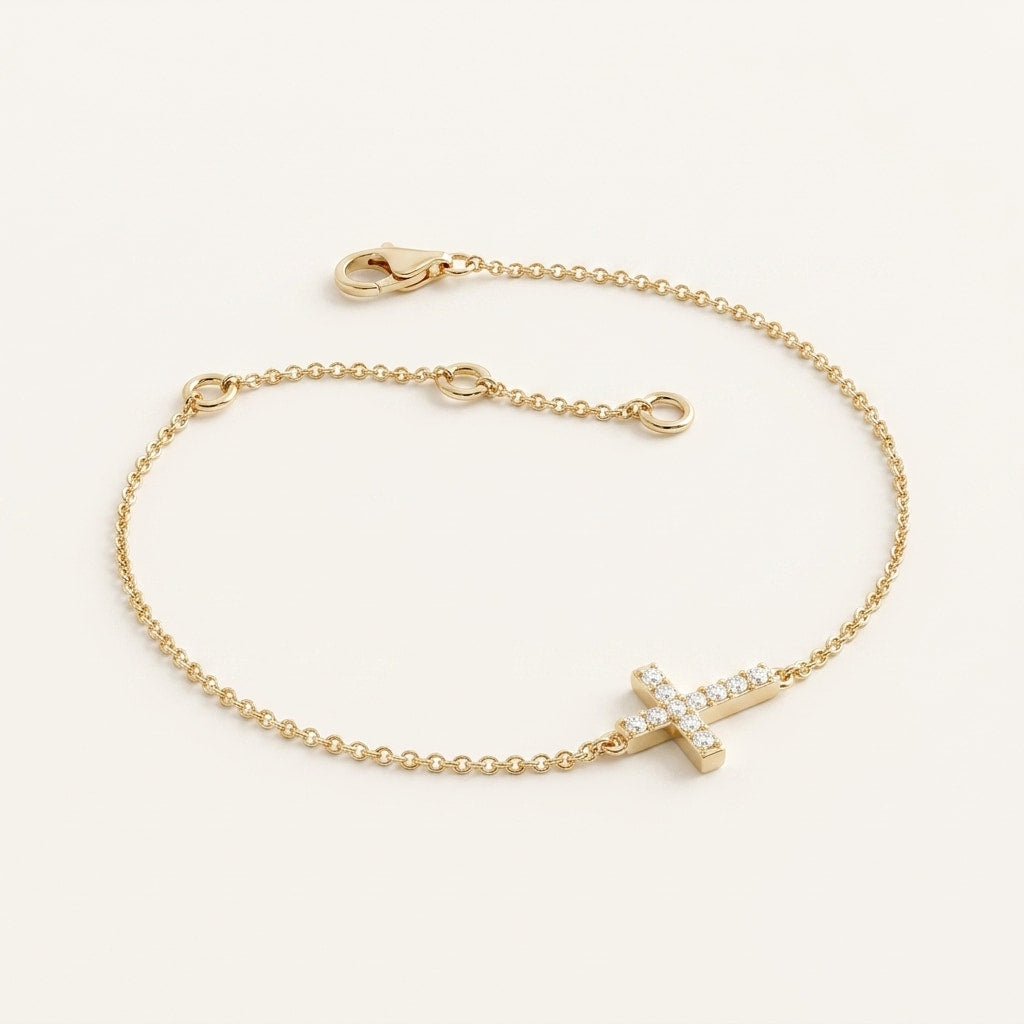 pavé diamond sideways cross chain bracelet in gold