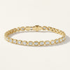 Bezel-Set Emerald Cut Diamond Tennis Bracelet in Gold