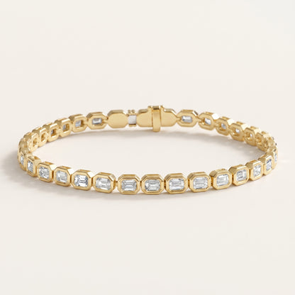 Bezel-Set Emerald Cut Diamond Tennis Bracelet in Gold