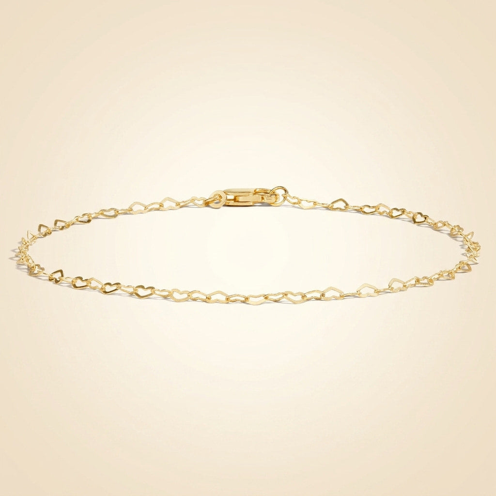 interlocking heart link chain bracelet in 14k gold