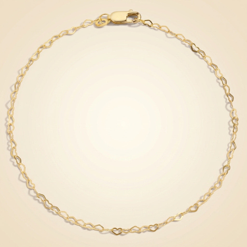 interlocking heart link chain bracelet in 14k gold