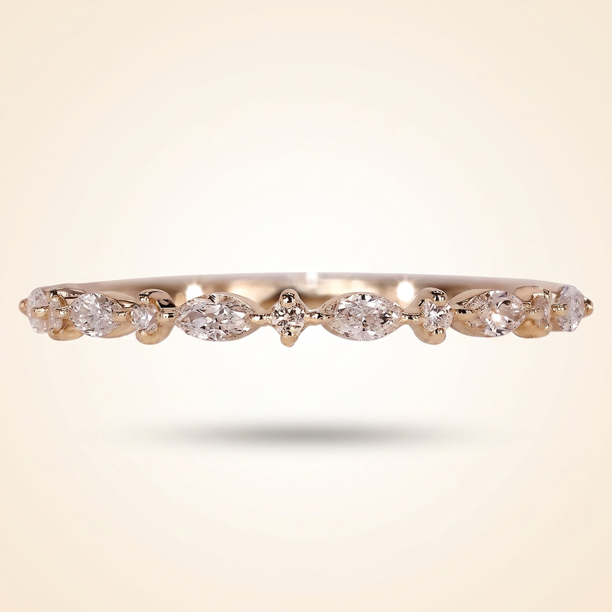 alternating marquise and round half eternity diamond band